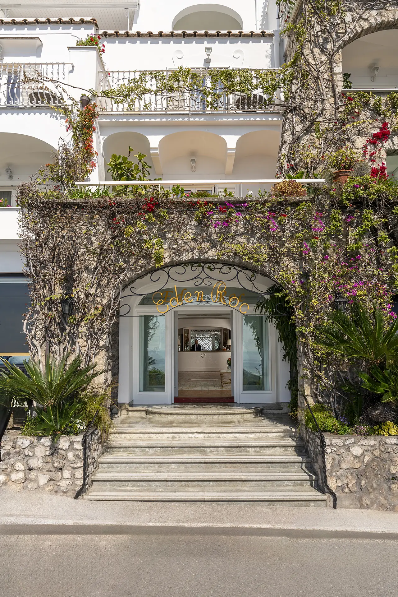 Eden Roc Positano front entrance with vine-covered arch