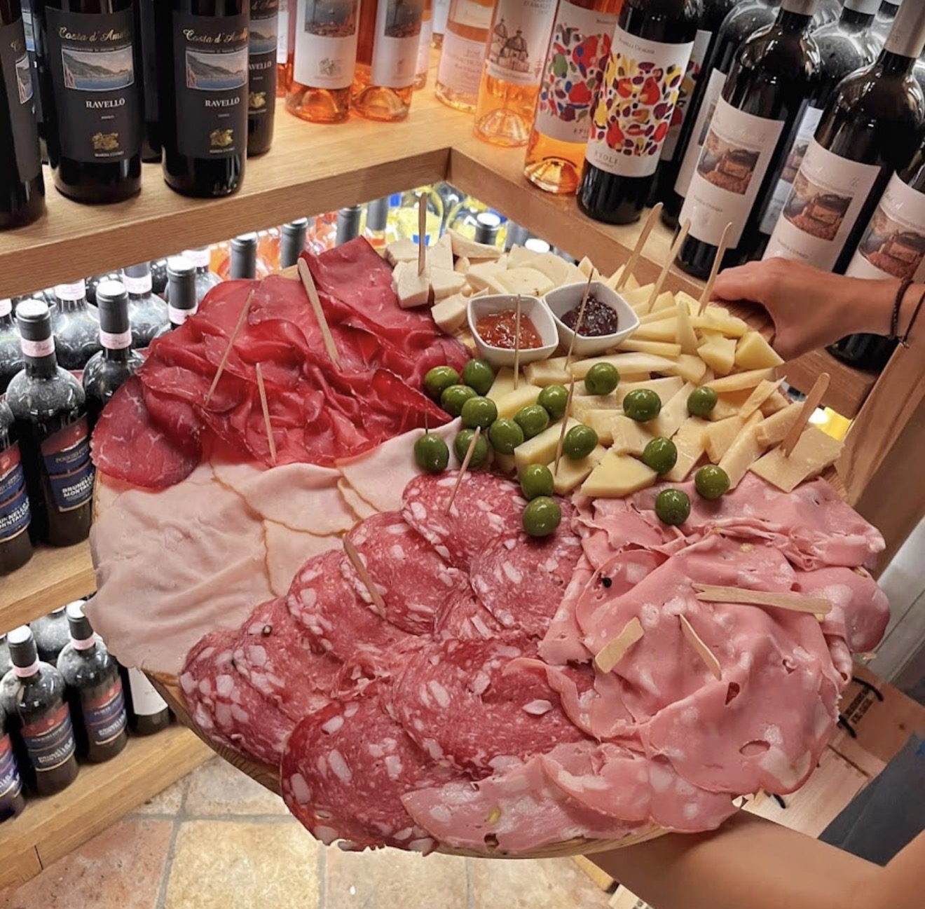 Antica Salumeria charcuterie board with wine in Sorrento