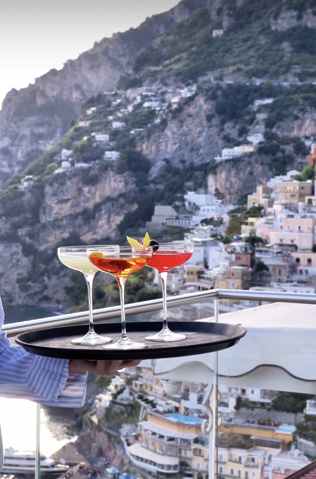 Eden Sky Bar cocktail tray overlooking Positano